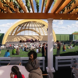 Outdoor amphitheater with crowd of attendees.
